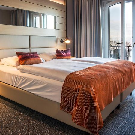 Hafenhotel Meereszeiten Хайлигенхафен Экстерьер фото